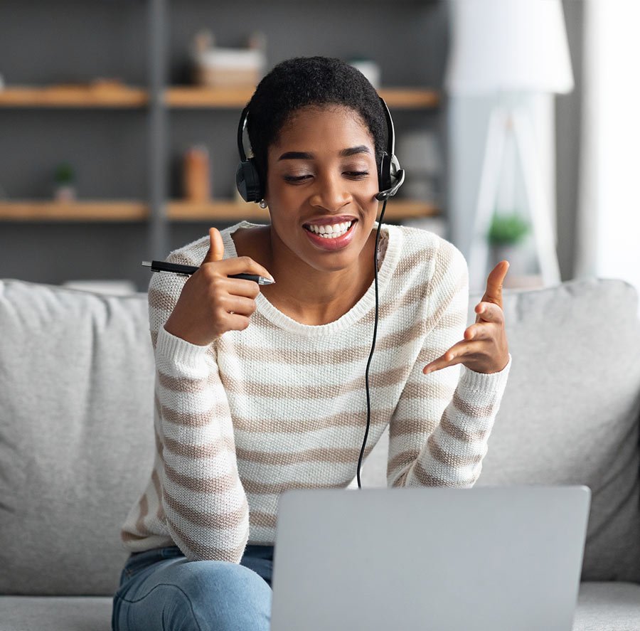 online-tutoring-cheerful-african-lady-in-headset-m-UAPME9Q